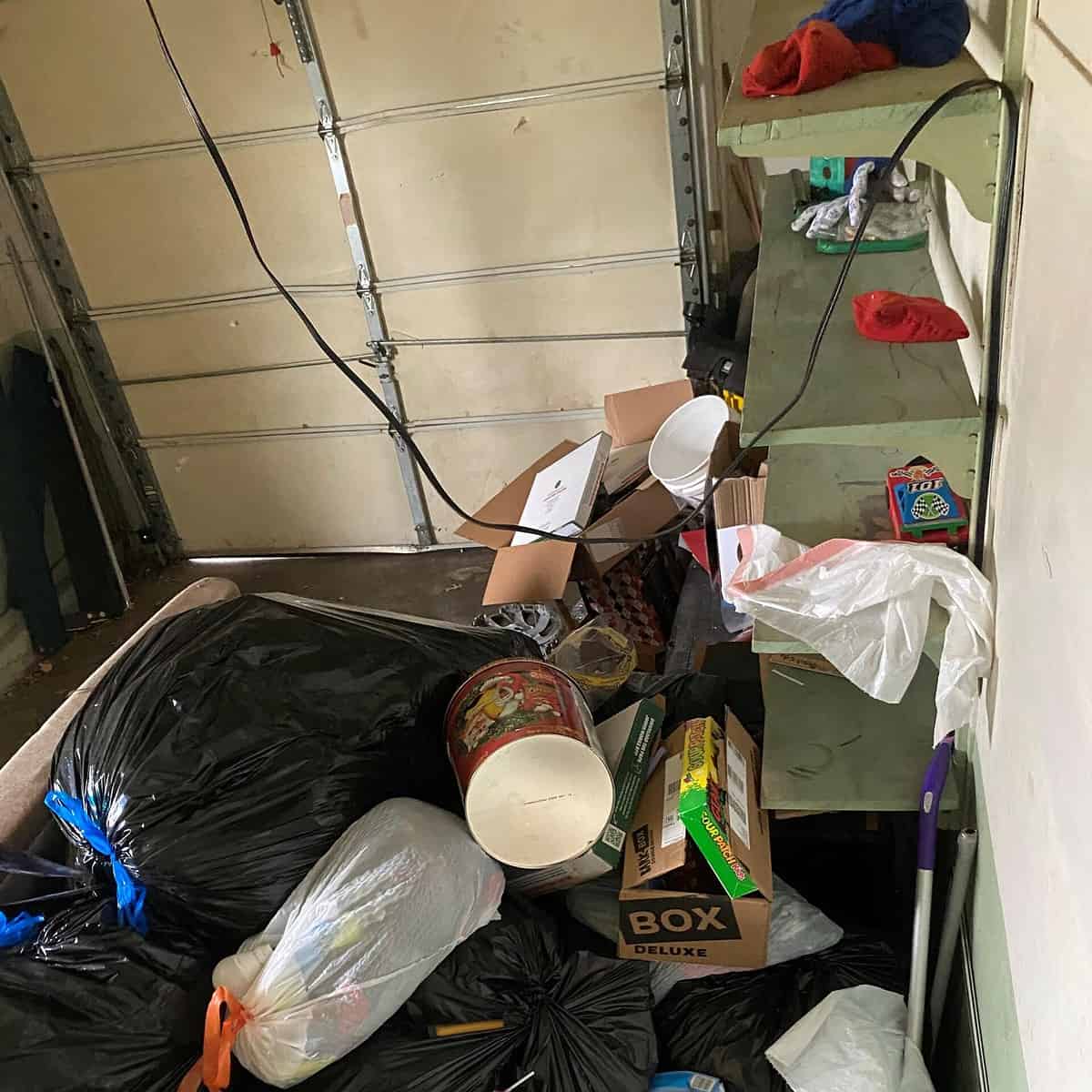 Before junk removal cleanout — east Kansas City property